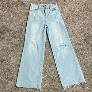 Vibrant Light Blue Distressed Flare Jeans